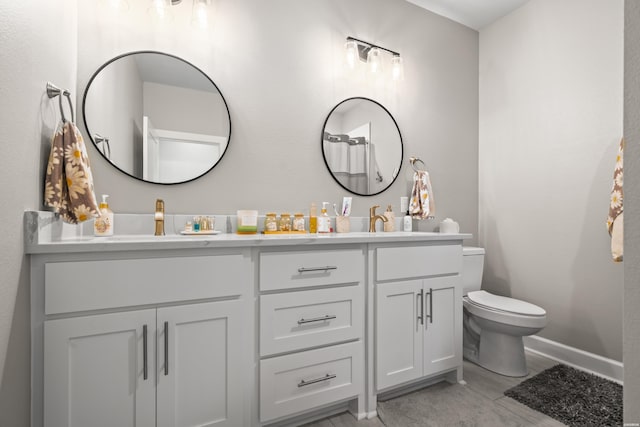 150 Villa Pointe Pt Unit A, Hot Springs, AR 71913 - bathroom with double vanity, toilet, and baseboards