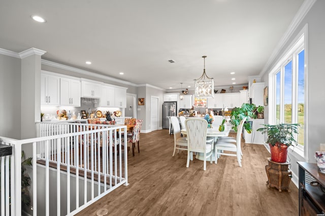 150 Villa Pointe Pt Unit A, Hot Springs, AR 71913 - dining room featuring ornamental molding, light wood-style flooring, recessed lighting, a chandelier, and baseboards