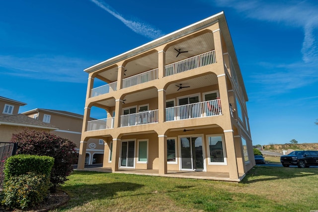 150 Villa Pointe Pt Unit A, Hot Springs, AR 71913 - back of house featuring a balcony, a ceiling fan, a yard, stucco siding, and a patio