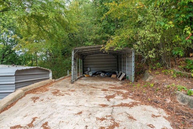 view of outdoor structure with a detached carport