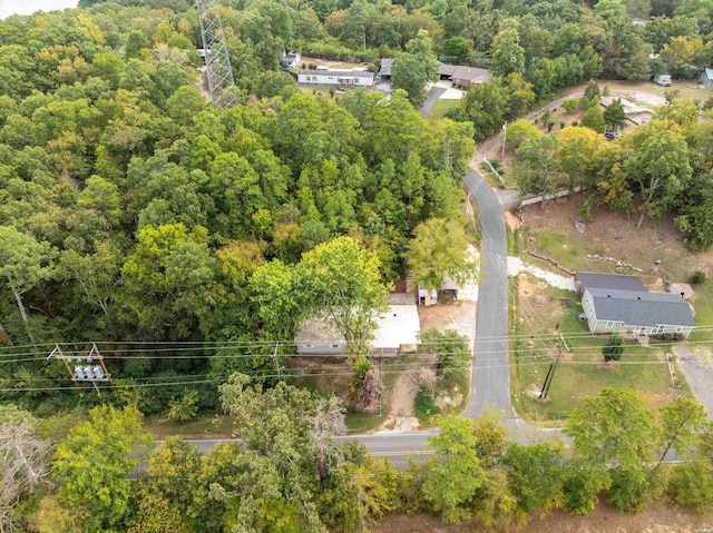 bird's eye view featuring a forest view