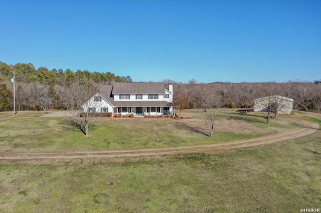 view of front of property featuring a porch and a front yard