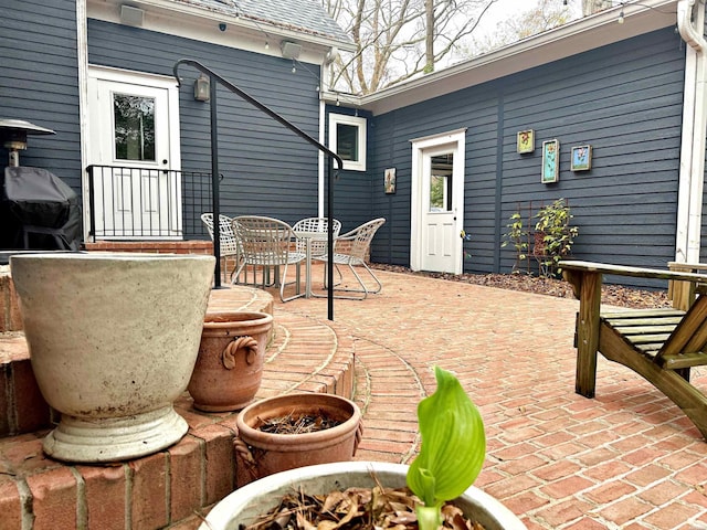 view of patio / terrace with outdoor dining area and grilling area