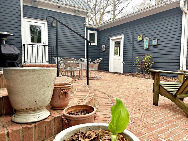 view of patio / terrace with outdoor dining area and grilling area