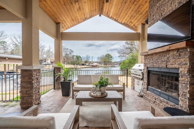 1129 Marion Anderson Rd, Hot Springs, AR 71913 - view of patio / terrace with a grill and an outdoor living space with a fireplace