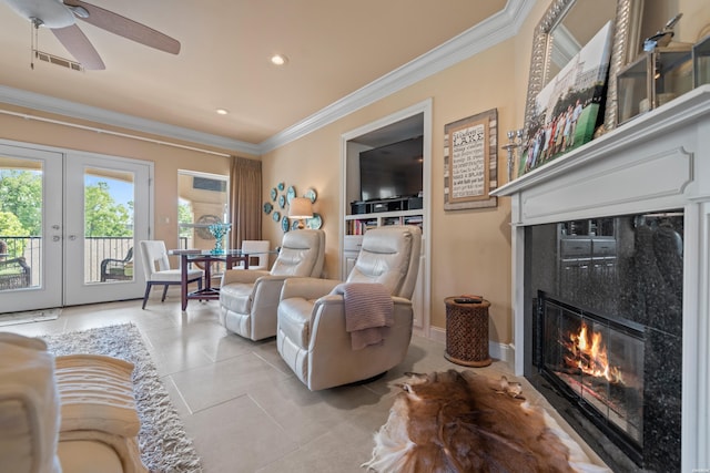 409 Halteria Ln Unit B, Hot Springs, AR 71913 - living room featuring healthy amount of natural light, crown molding, a tiled fireplace, light tile patterned floors, and a ceiling fan