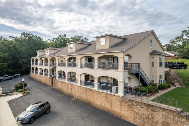 409 Halteria Ln Unit B, Hot Springs, AR 71913 - view of building exterior featuring stairs