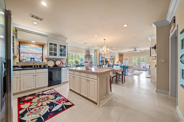 409 Halteria Ln Unit B, Hot Springs, AR 71913 - kitchen with dishwasher, crown molding, open floor plan, glass insert cabinets, and a kitchen island