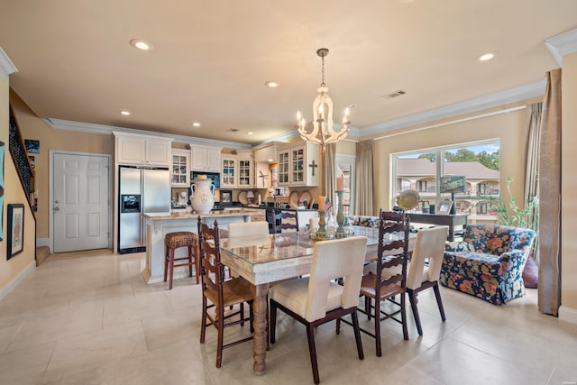 409 Halteria Ln Unit B, Hot Springs, AR 71913 - dining space featuring a chandelier, recessed lighting, crown molding, and light tile patterned floors