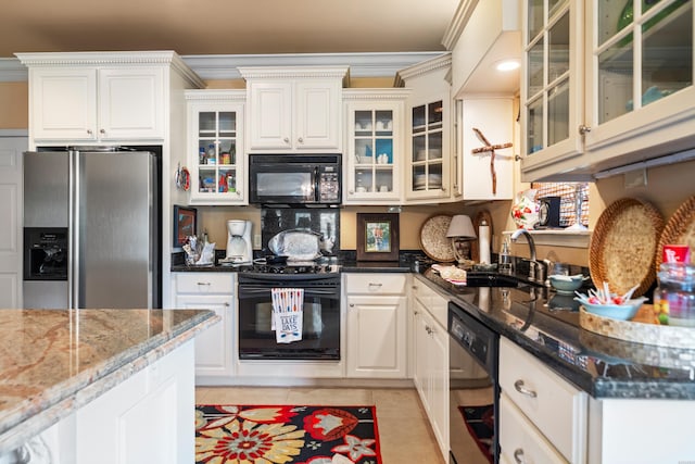 409 Halteria Ln Unit B, Hot Springs, AR 71913 - kitchen featuring black appliances, crown molding, light tile patterned floors, dark stone counters, and glass insert cabinets