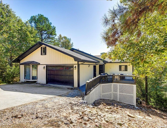 23 Ponferrada Way, Hot Springs Village, AR 71909 - ranch-style house featuring an attached garage and concrete driveway