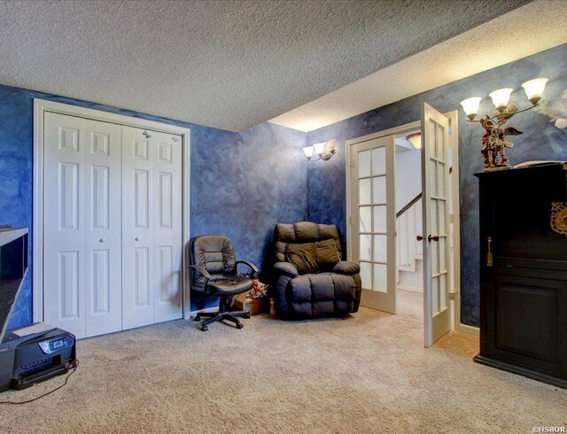 23 Ponferrada Way, Hot Springs Village, AR 71909 - living area featuring carpet, a textured ceiling, and french doors