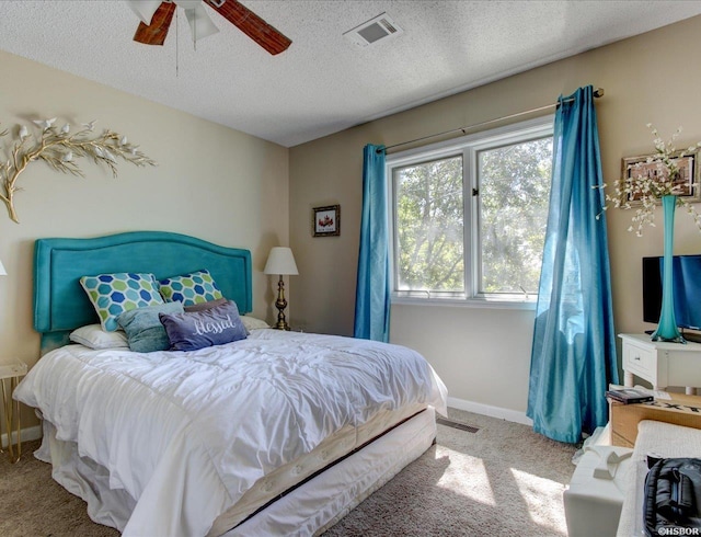 23 Ponferrada Way, Hot Springs Village, AR 71909 - bedroom with carpet, baseboards, a textured ceiling, and a ceiling fan