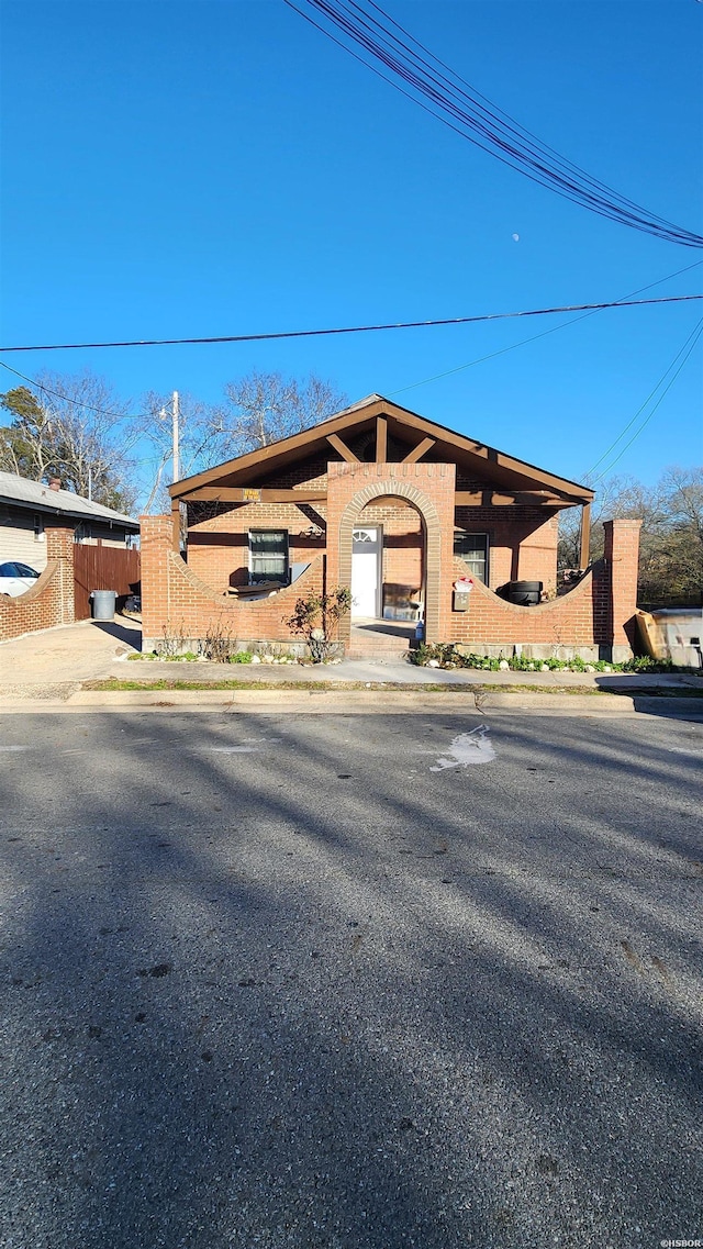 view of front of property with fence