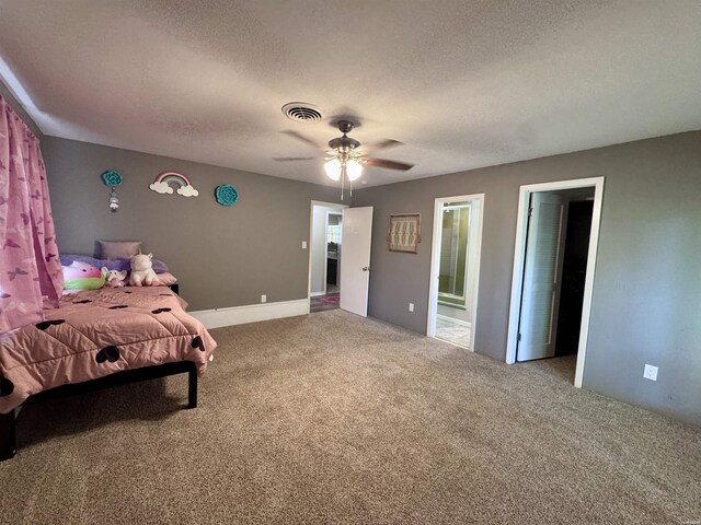 612 Independence, Hot Springs, AR 71913 - carpeted bedroom with ceiling fan, visible vents, and a textured ceiling