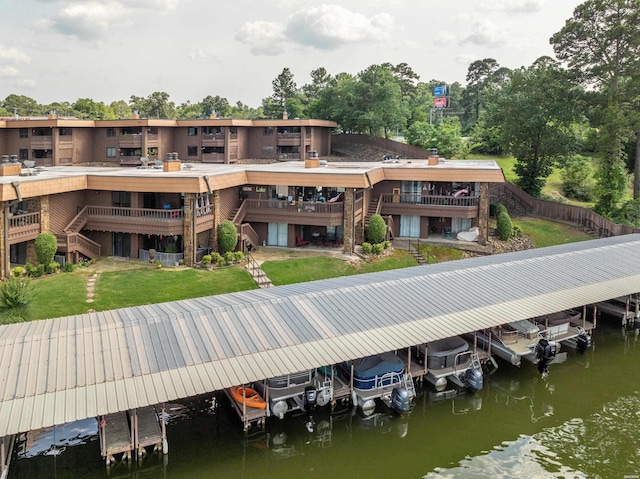 1412 Airport Rd, Hot Springs, AR 71913 - dock with boat lift, a lawn, a water view, and view of scattered trees