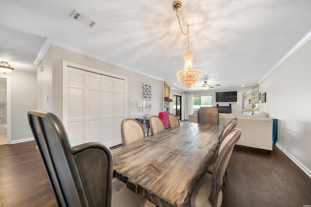 1412 Airport Rd, Hot Springs, AR 71913 - dining space with dark wood-style floors, ornamental molding, ceiling fan, and a chandelier