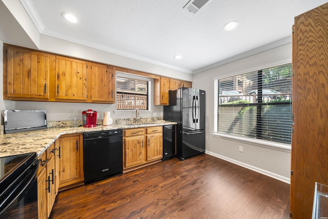 1412 Airport Rd, Hot Springs, AR 71913 - kitchen with black appliances, brown cabinetry, ornamental molding, dark wood-style flooring, and light stone countertops