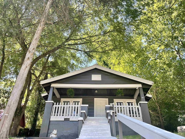 view of front of property featuring covered porch