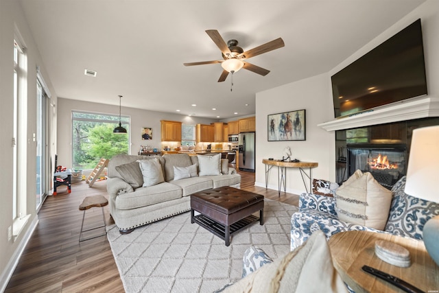 180 Port Au Prince, Hot Springs, AR 71913 - living room featuring light wood finished floors, a ceiling fan, a tile fireplace, and recessed lighting