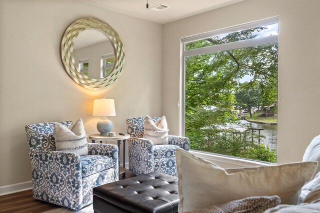 180 Port Au Prince, Hot Springs, AR 71913 - sitting room featuring a water view, wood finished floors, and baseboards