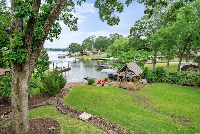 180 Port Au Prince, Hot Springs, AR 71913 - view of grassy yard with a water view and a dock