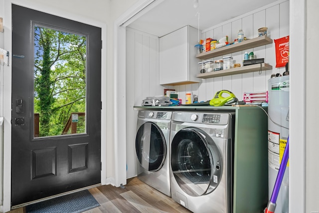 340 Vanadium Cir, Hot Springs, AR 71901 - laundry area with laundry area, washing machine and dryer, wood finished floors, and water heater