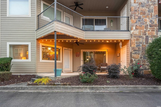 640 Arkridge Rd Unit D6, Hot Springs, AR 71913 - property entrance with a balcony, ceiling fan, and stone siding
