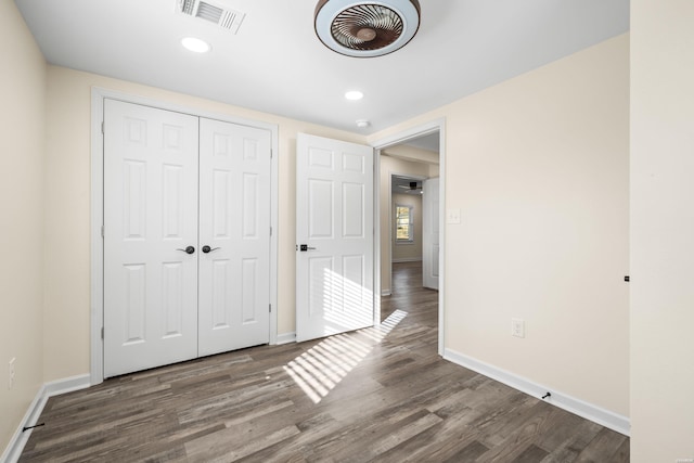 196 Morphew Rd, Hot Springs, AR 71913 - unfurnished bedroom with wood finished floors, baseboards, a closet, and recessed lighting
