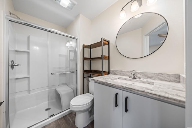 196 Morphew Rd, Hot Springs, AR 71913 - full bath featuring a stall shower, toilet, wood finished floors, and vanity
