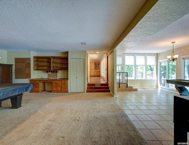 255 Springbrook, Hot Springs, AR 71913 - living area with a textured ceiling, pool table, visible vents, stairway, and a notable chandelier