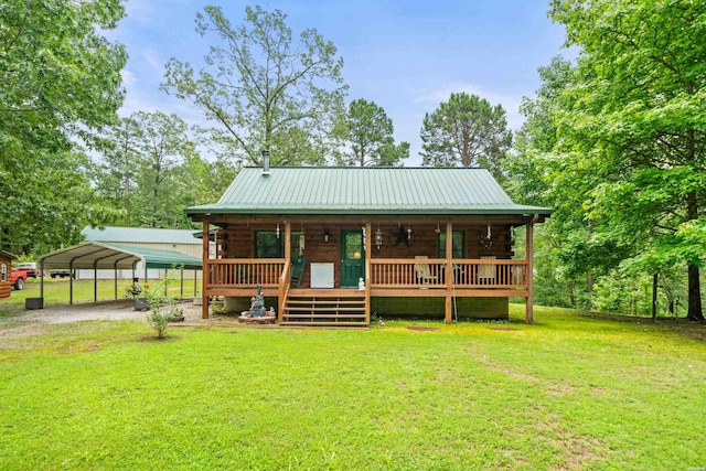 273 Alydar Trl, Hot Springs, AR 71901 - log cabin with a front lawn, log siding, a detached carport, driveway, and covered porch