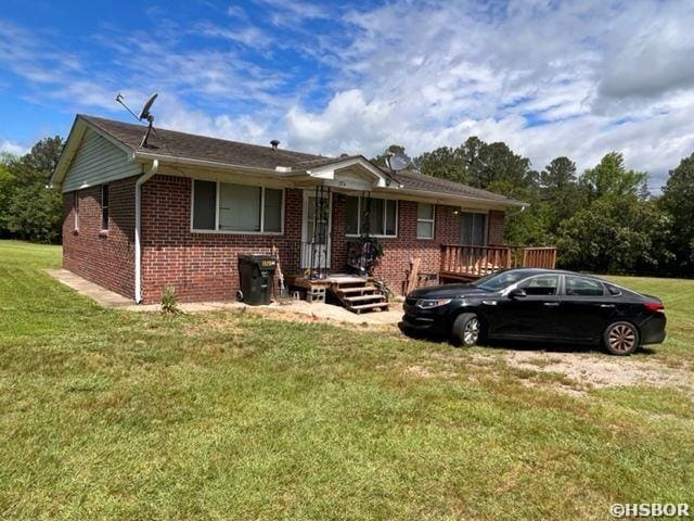 1526 Pearcy Rd, Pearcy, AR 71964 - view of front of property featuring brick siding and a front yard