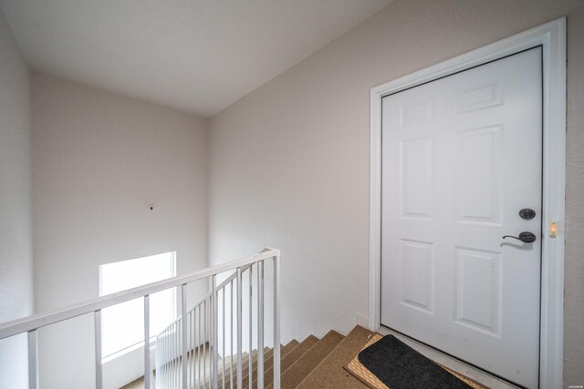 doorway to property with a balcony