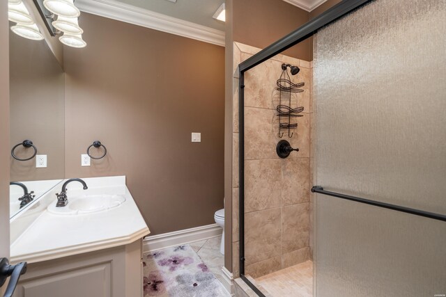 full bath with vanity, baseboards, a shower stall, tile patterned floors, and crown molding