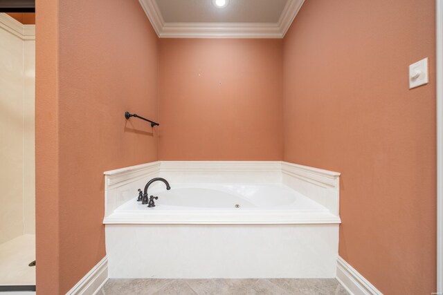 full bathroom with baseboards, a bath, and crown molding