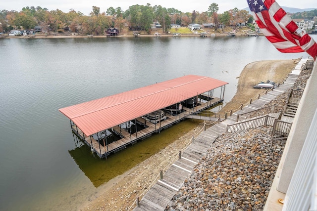 dock area featuring a water view and boat lift