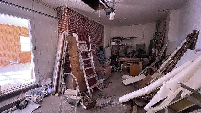 interior space with visible vents and wooden walls