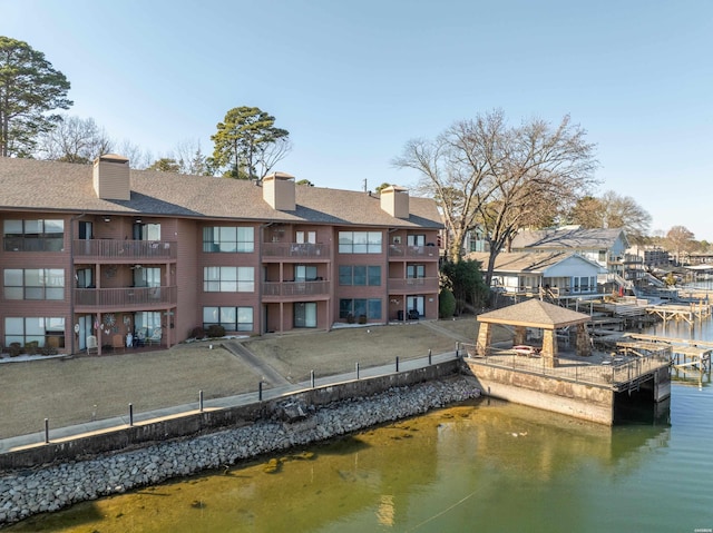 dock area featuring a water view and a gazebo