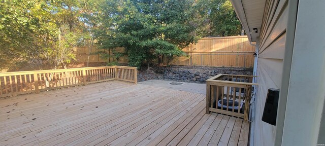 deck featuring a fenced backyard