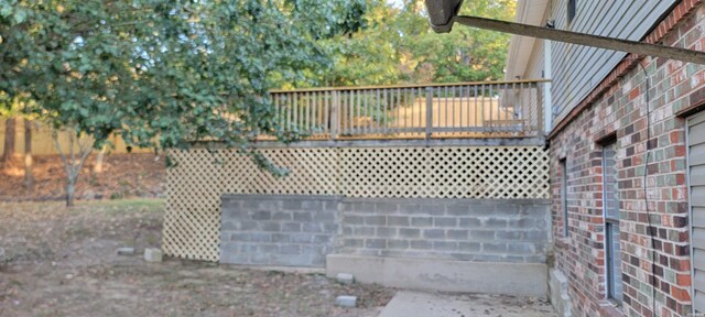 view of gate featuring a deck