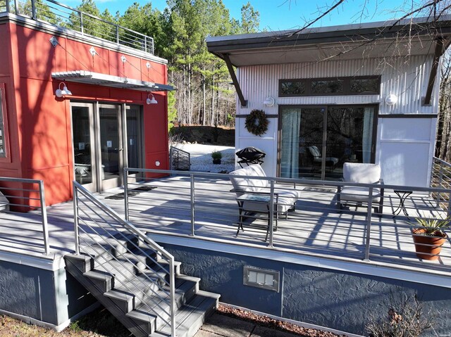 view of patio / terrace featuring stairway