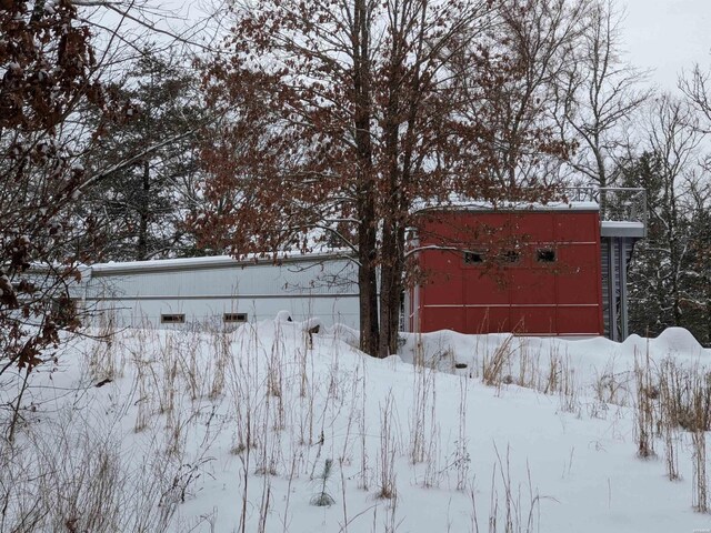 view of snowy yard