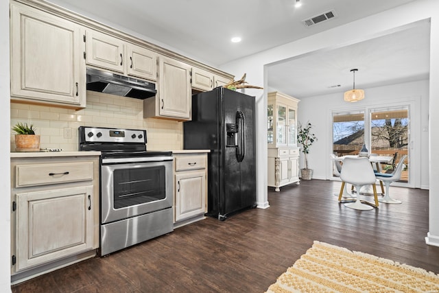 kitchen featuring stainless steel electric stove, visible vents, light countertops, black refrigerator with ice dispenser, and under cabinet range hood