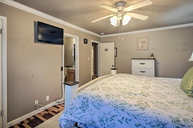 bedroom featuring a textured ceiling, baseboards, crown molding, and wood finished floors