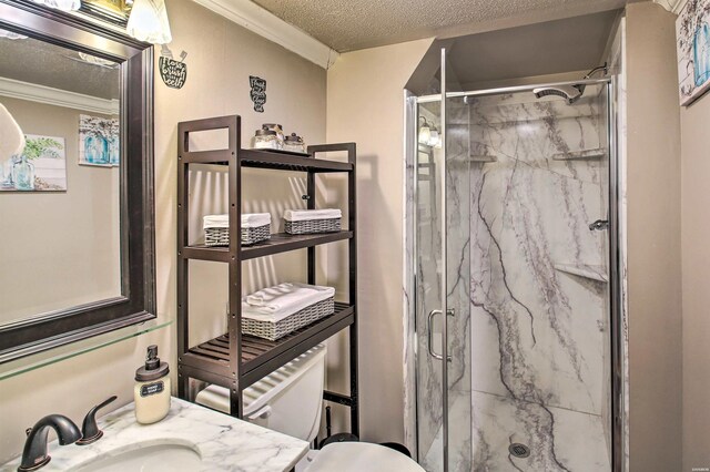 full bathroom with ornamental molding, a textured ceiling, and a marble finish shower