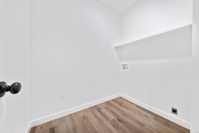 laundry area with washer hookup, laundry area, and baseboards