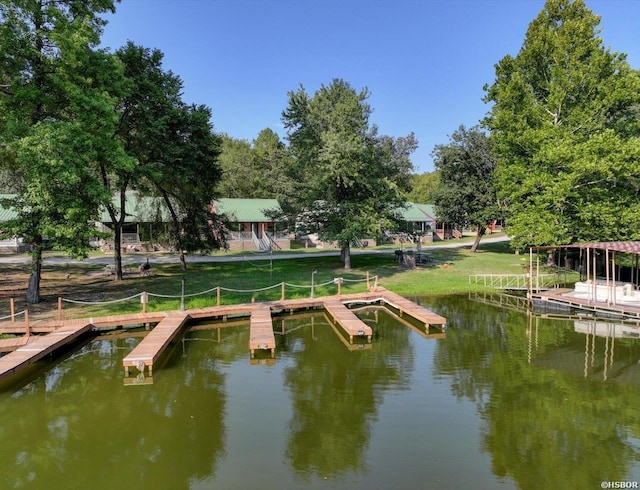 dock area featuring a water view