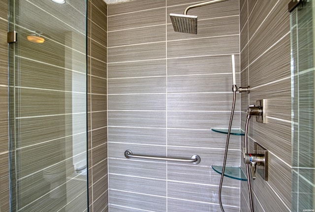 full bathroom with a shower stall