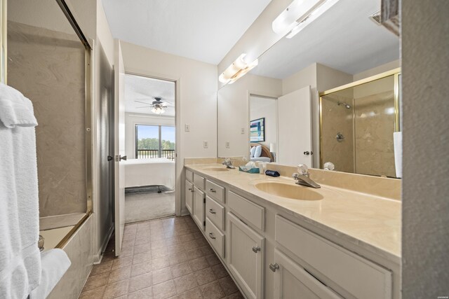 5371 Central Ave Unit 5K, Hot Springs, AR 71913 - bathroom with connected bathroom, double vanity, a shower with door, and a ceiling fan
